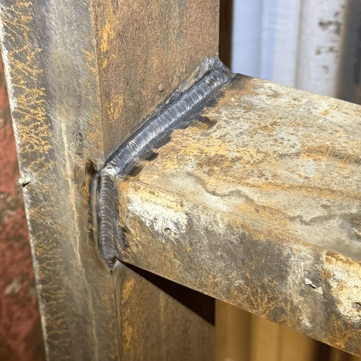 Box section welded to a post