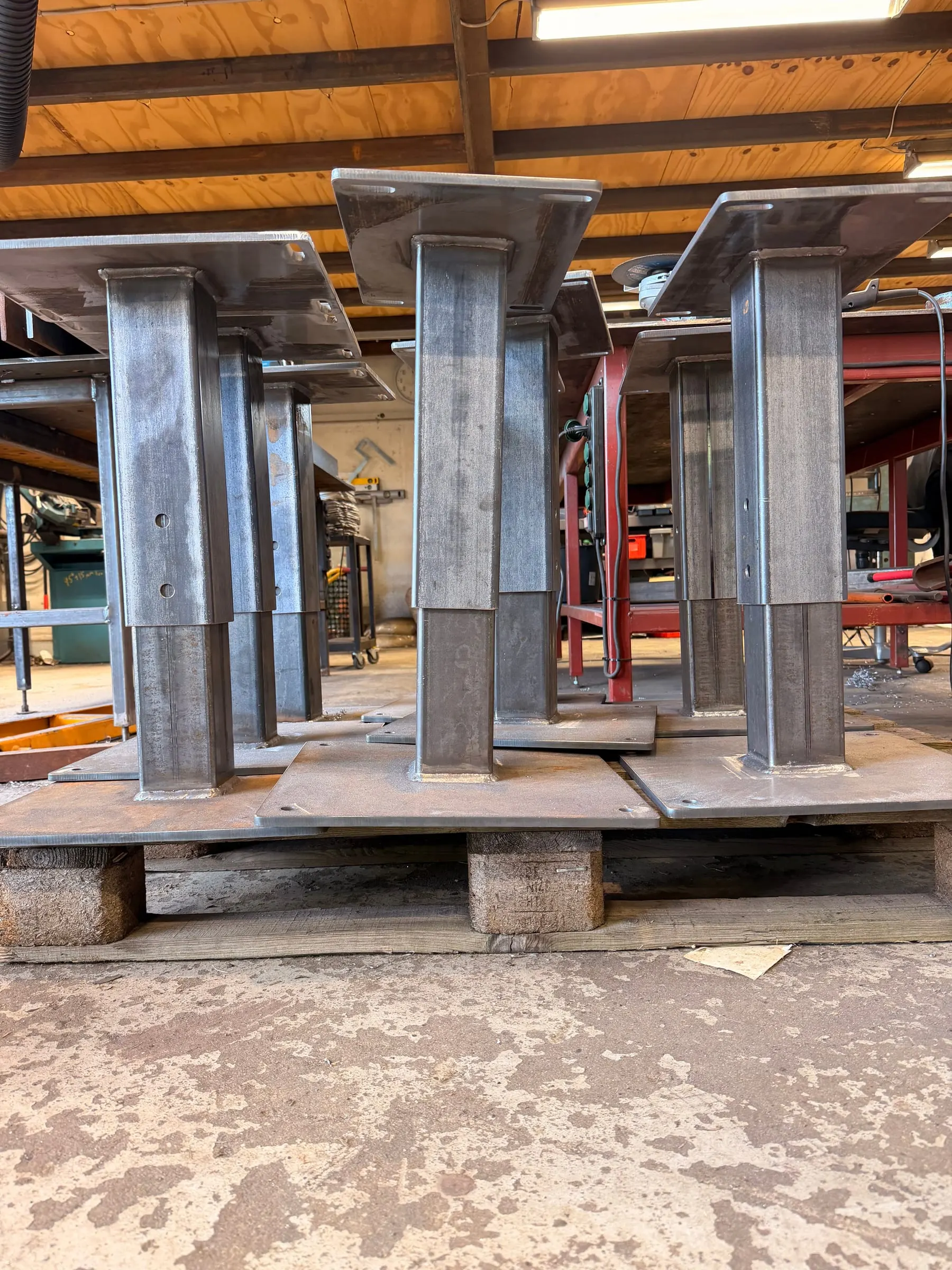 Steel columns with cap plates